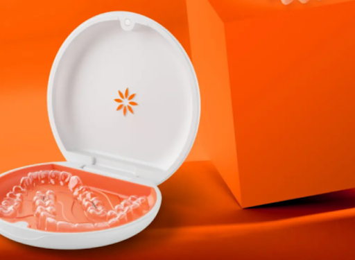 Spark clear aligners on display in their holding case.